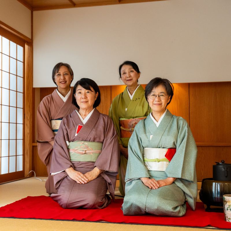 Four women in kimono at a tea ceremony room